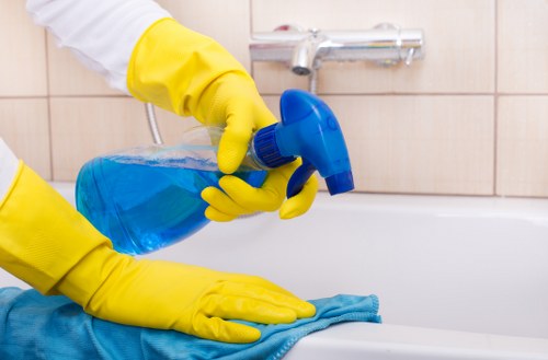Carpet cleaning team protecting property and maintaining a safe, professional workspace