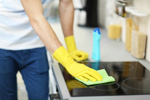 Risk assessment checklist and cleaning tools arranged before a carpet cleaning job